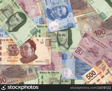 Mexican Peso bills scattered randomly all over.