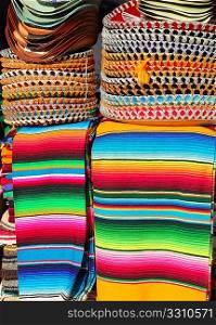 Mexican serape colorful stacked and charro hats mariachi