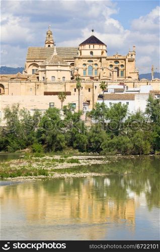 Mezquita Cathedral (The Great Mosque) by the Guadalquivir river in Cordoba, Spain, Andalusia region.