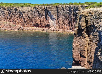 Mezzaluna cliffs in San Pietro island, Sardinia, Italy