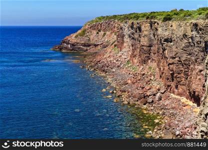 Mezzaluna cliffs in San Pietro island, Sardinia, Italy. Mezzaluna gulf in San Pietro isle