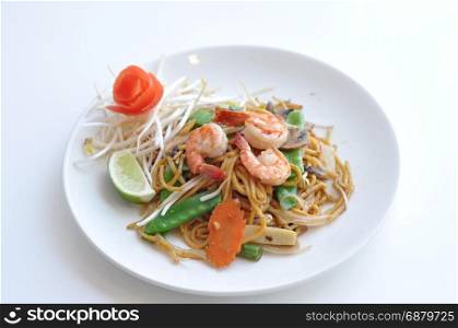 Mi Xao. Lo mein noodles stir-fried with your choice of meat chicken, beef or tofu and mixed vegetables.