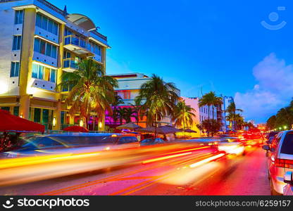 Miami Beach South Beach sunset in Ocean Drive Florida Art Deco and car lights