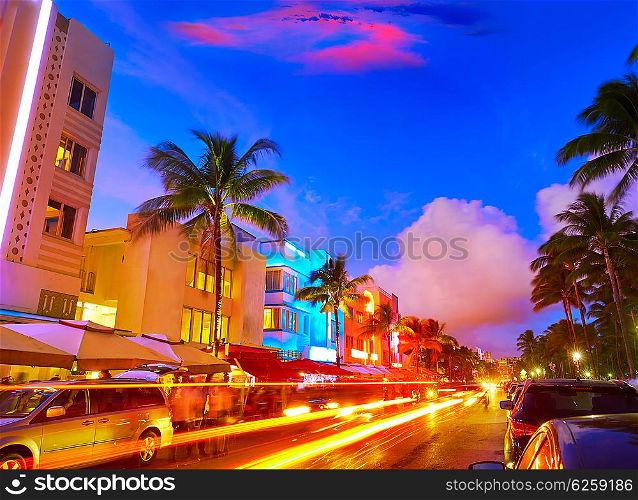 Miami Beach South Beach sunset in Ocean Drive Florida Art Deco and car lights