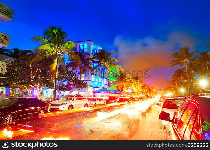 Miami Beach South Beach sunset in Ocean Drive Florida Art Deco and car lights