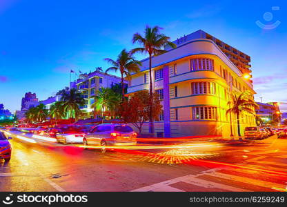 Miami Beach South Beach sunset in Ocean Drive Florida Art Deco and car lights