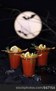 Michelada - Mexican alcoholic cocktail, tomato juice, spicy sauce and spices. Great idea for a Halloween party.