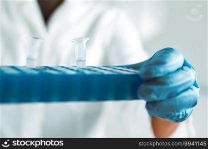 Microbiology. Hands of a microbiologist holding biological s&les