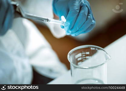 Microbiology. Hands of a microbiologist working with bacteria