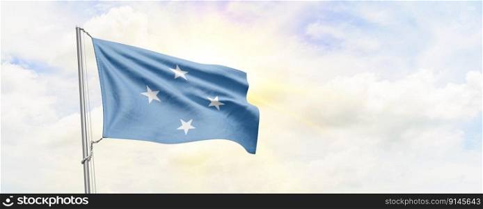 Micronesia Federated States flag waving on sky background. 3D Rendering