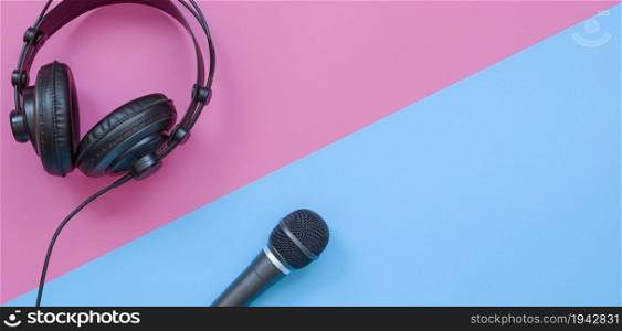 Microphone and headphone on a purple and blue background