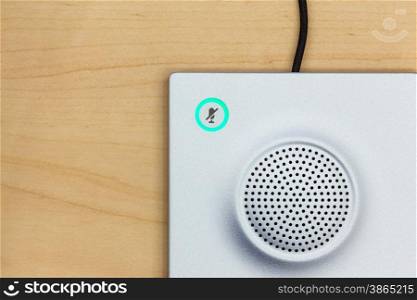 Microphone icon switch, and loudspeaker on wood background for conferencing room
