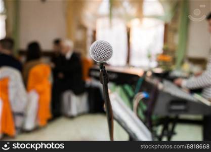microphone in concert hall or conference room or on stage