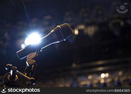 microphone on stage before the performance of the artist