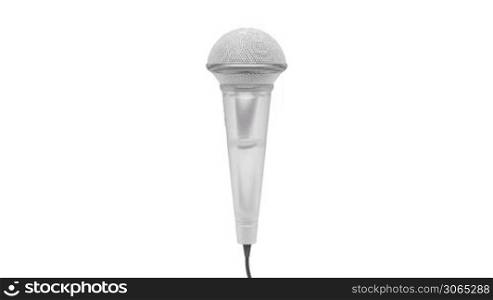 Microphone rotates on white background
