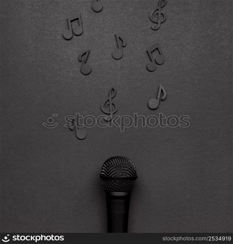microphone with black musical notes