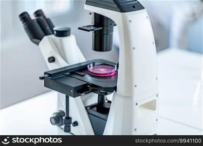 Microscope with s&le in laboratory