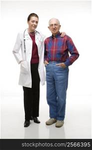 Mid-adult Caucasian female doctor with arm around elderly Caucasian male&acute;s shoulder.