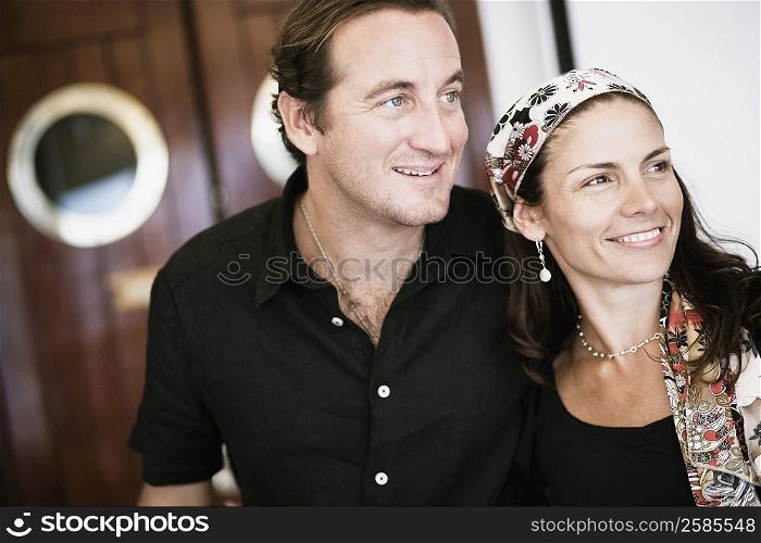 Mid adult couple smiling