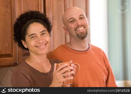 Mid adult couple smiling, portrait