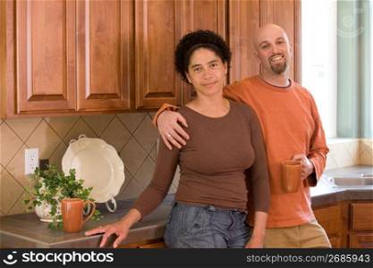 Mid adult couple smiling, portrait