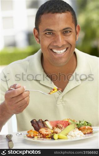 Mid Adult Man Dining Al Fresco