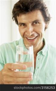 Mid Adult Man Drinking A Glass Of Water