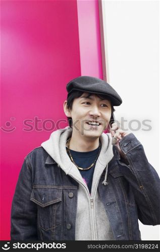 Mid adult man talking on a mobile phone