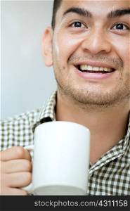Mid adult man with a coffee