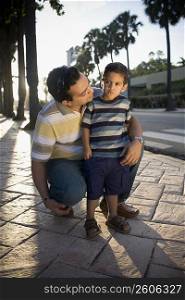 Mid adult man with his son, Malecon, Santo Domingo, Dominican Republic