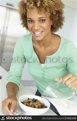Mid Adult Woman Eating Healthy Breakfast