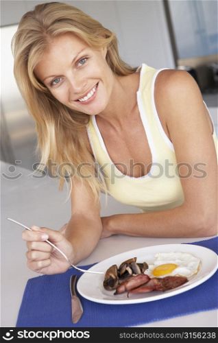Mid Adult Woman Eating Unhealthy Breakfast
