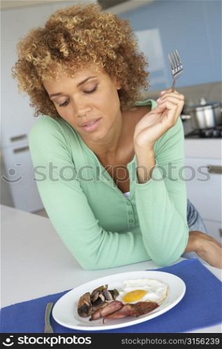 Mid Adult Woman Eating Unhealthy Breakfast