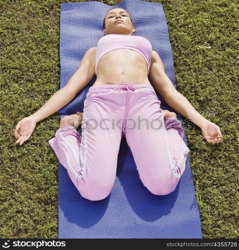 Mid adult woman exercising