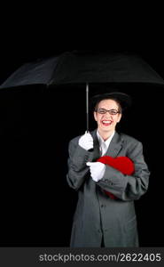 Mid adult woman holding umbrella, portrait