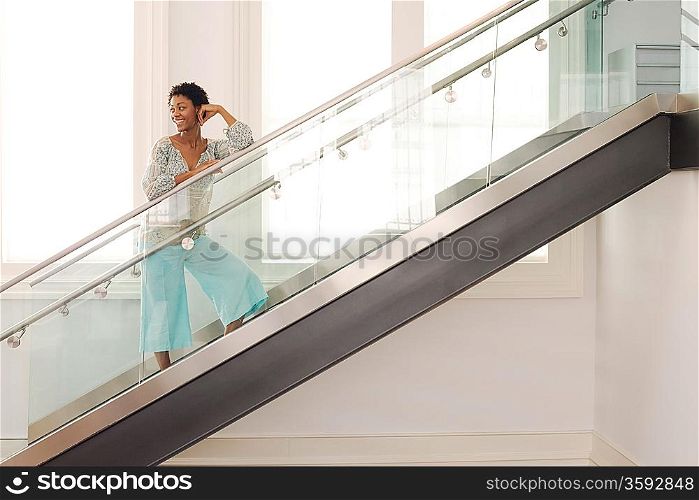 Mid-adult woman on stairs