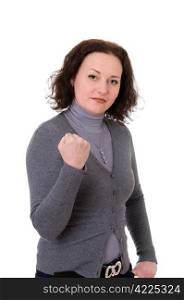 mid adult woman shows the fist isolated on white background
