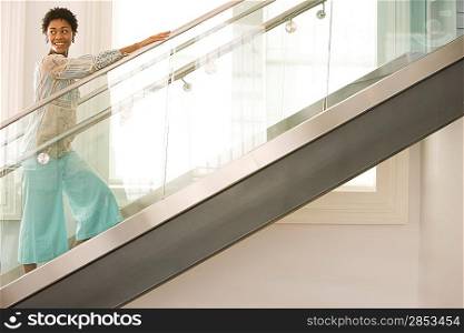 Mid-adult woman walking up stairs
