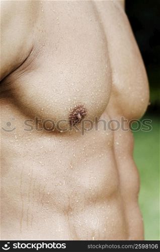 Mid section view of a bare chested man