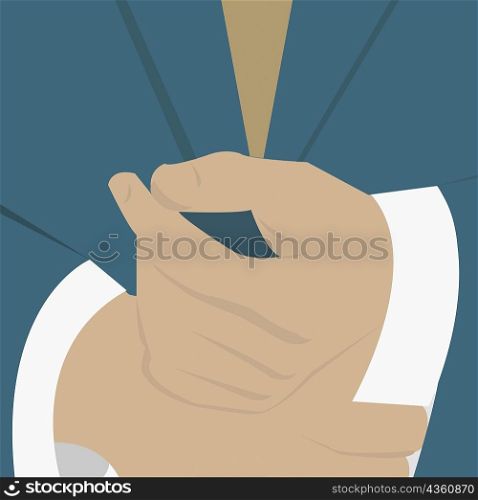 Mid section view of a businessman buttoning his cuffs