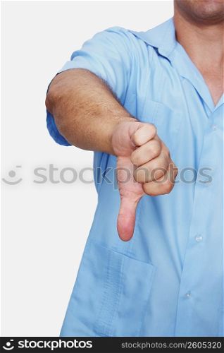 Mid section view of a male nurse showing a thumbs down sign