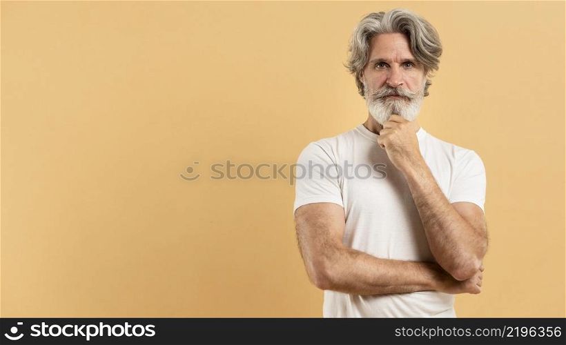 mid shot old man thinking with copy space