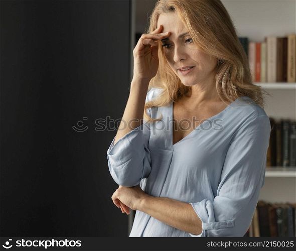 mid shot worried woman counselor office