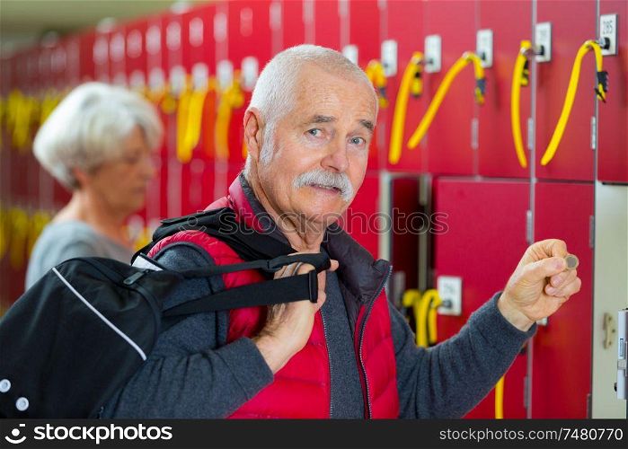 middle age sportive man locker room