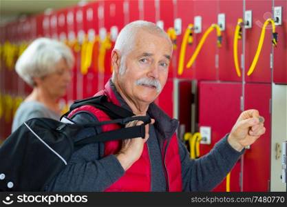 middle age sportive man locker room