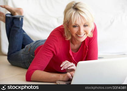 Middle age woman on her laptop computer