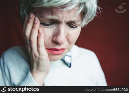 Middle age woman suffering pain