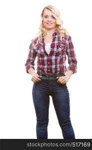 Middle aged blonde attractive woman wearing jeans pants plaid shirt posing, studio shot, isolated on white. Mid aged woman casual style posing
