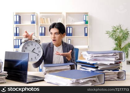 Middle aged businesslady unhappy with excessive work 