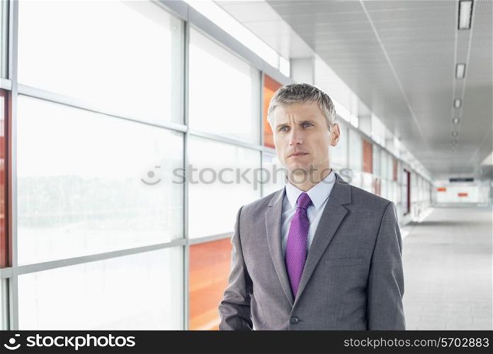 Middle aged businessman at train station